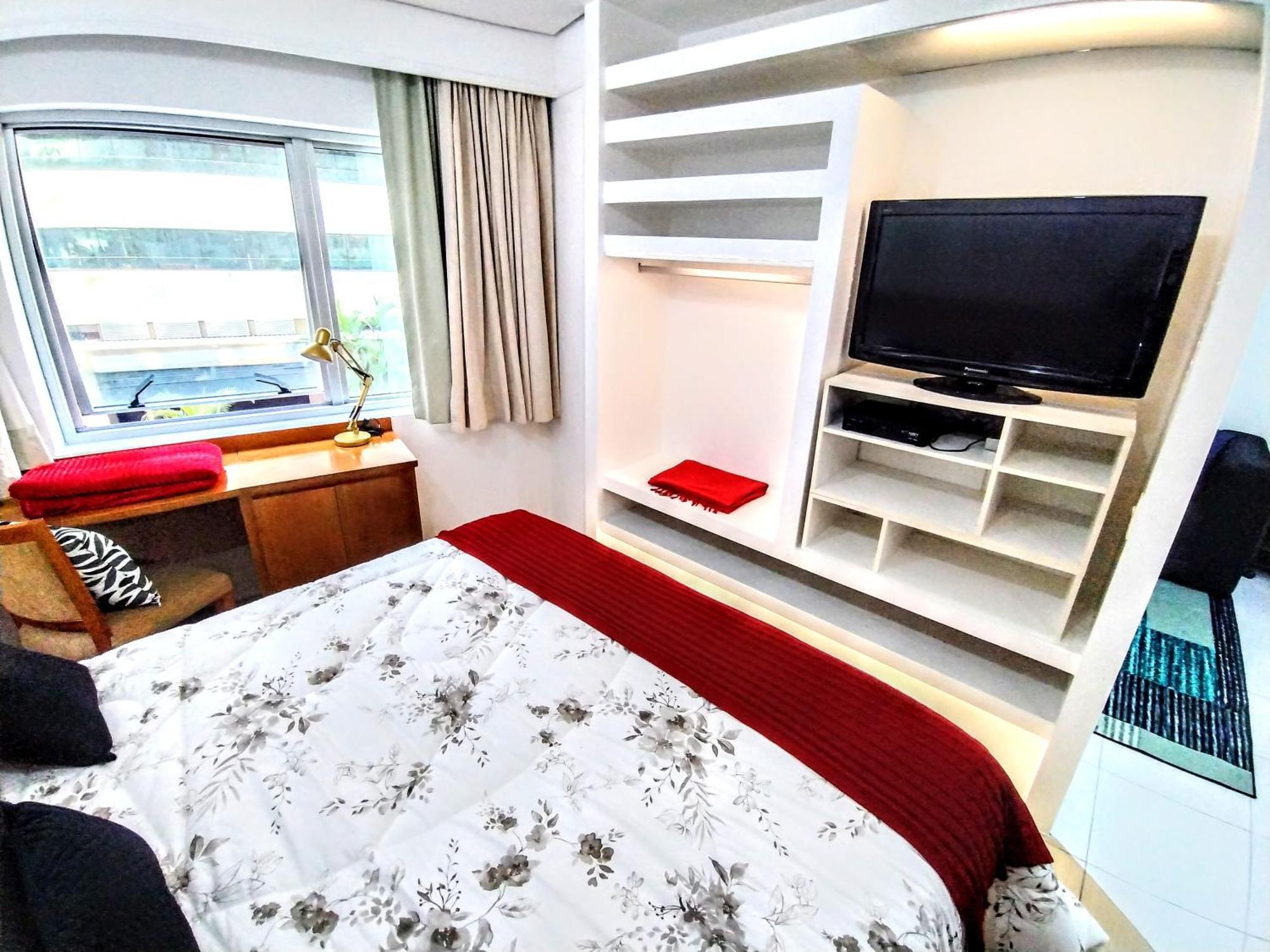 Radisson Vila Olimpia São Paulo Luaran gambar A bedroom in a typical apartment